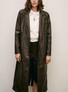 Trench-coat long en cuir avec ceinture assortie ample