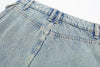 Jupe salopette courte en jean français avec poche zippée