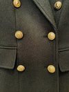 Manteau long en laine coupe slim avec boucle de lion en métal à double boutonnage